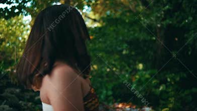 An Asian woman with blonde hair exploring the tropical island with an amaze expression lonely