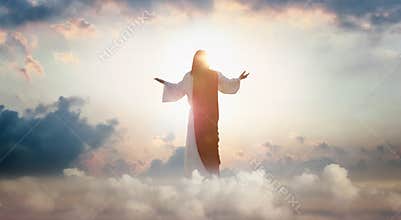 Resurrected Jesus Christ ascending above the sky and clouds, heaven concept