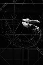 A boy diver performs