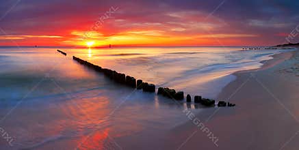 Baltic sea at beautiful sunrise in Poland beach.