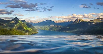 Scenic and beautiful mountain view with clouds overlooking Lake Luzerne.