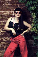 Girl wearing red sun glasses