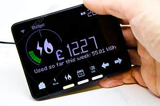 Smart Meter Monitor in Man Hand