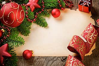 Frame with vintage paper and Christmas decorations