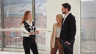Couple of businesspeople for renting, buying or purchasing commercial premises.