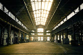 Abandoned industrial interior with bright light