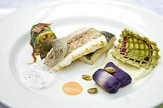 Fish cooked with rice, zucchini