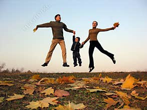 Fly happy family with autumn leaves