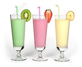 Banana, kiwi and strawberry milk shake and fresh fruis
