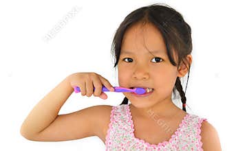 Cute asian girl and toothbrush