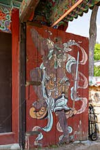 Beomeosa temple, Korean traditional craftsmanship, colorful painted door in Busan, South Korea. Entrance to the temple