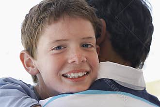 Happy Son Embracing Father