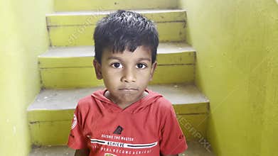 A kid was feeling boredom