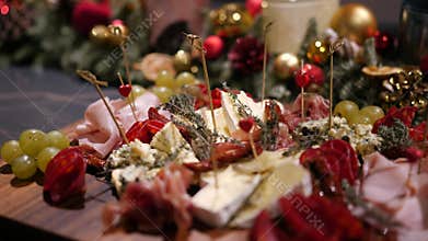 Beautifully served banquet table with different food snacks and appetizers.