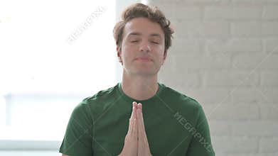 Wishing Young Man Praying for Help to God