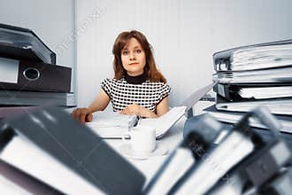 Business woman working in office with documents