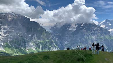 Tourists among the Swiss Alps at First, Switzerland