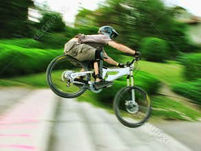Bike rider at urban downhill competition
