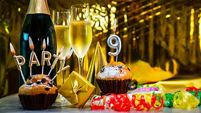 Happy birthday background with champagne glasses with number cake 9. Beautiful birthday card with decorations copy space