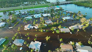 Flooded houses by hurricane Ian rainfall in Florida residential area. Consequences of natural disaster