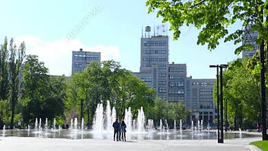 Derzhprom building with fountain in spring city