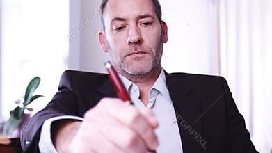 Businessman writing