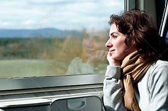 Young woman travelling by train