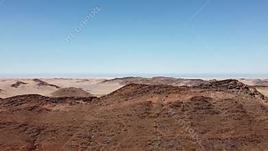 Aerial view of Namibian dunes and mountains