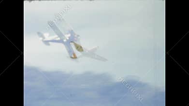 Vintage airshow, biplanes and transport aircraft performing aerobatics