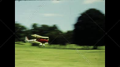 Biplanes performing aerobatics in the 1970s uk