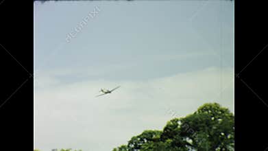 Vintage military jet aircraft performing aerobatics in uk airshow