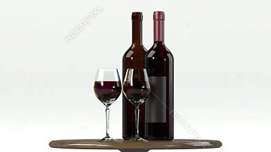 Glass of red wine with bottle