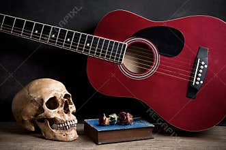 Skull with acoustic guitar