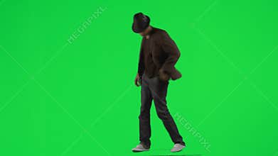 Ethnic young man dancing with a hat and a jacket footage