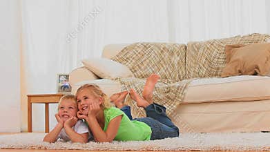 Cute children watching tv