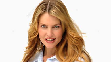 Relaxed blonde woman looking at the camera