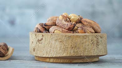 cashew nuts served in a wooden bowl for a healthy snack