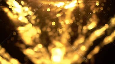 Mesmerizing Golden Bokeh Lights Dance in Abstract Motion: A Warm, Inviting Visual Experience