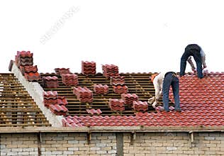 Workers Laying Roof Tiles