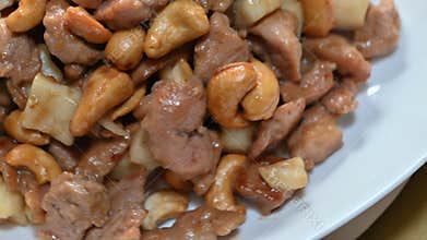 sauteed Chicken cashew Common Yam nugget turn table