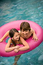 Children swimming inner tube