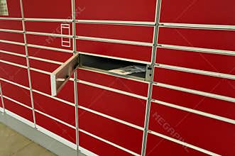 Mailboxes in the red wall, closeup of photo with soft focus