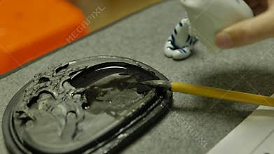 close shot of Chinese Calligraphy writing