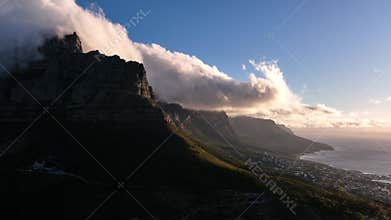 Aerial drone shot during the sunset over the Twelve Apostles on Victoria's coast in Australia.