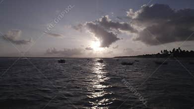 A scenic view of boats at dawn at Praia Da Baleia, Itapipoca, Brazil