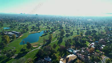 Drone over the central Phoenix golf course on a bright sunny day in AZ, United States