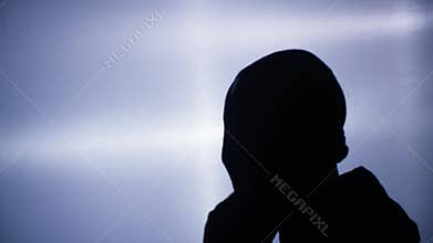 criminal concept, male thief wears balaclava to commit crime and steal