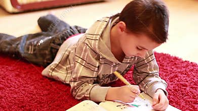 Little boy coloring