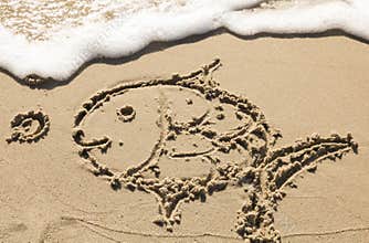 Painting of a fish in the sand
