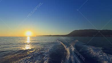 Stern boat wake at cruising speed on the Mediterranean coast